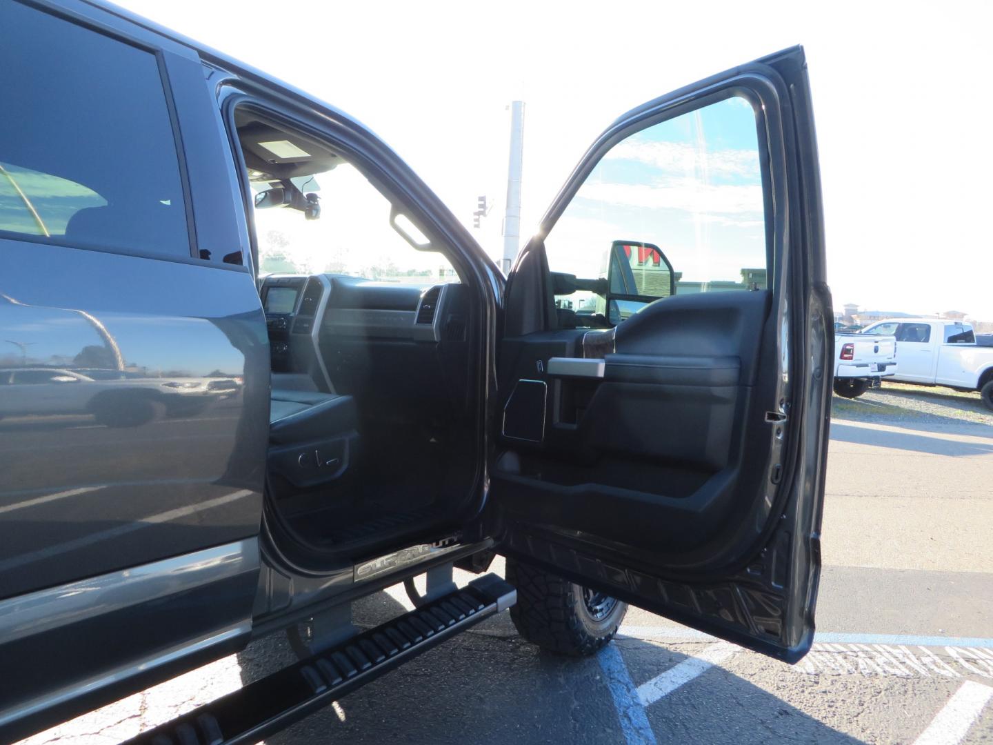 2019 CHARCOAL /BLACK Ford F-350 SD Lariat Crew Cab 4WD (1FT8W3BT7KE) with an 6.7L V8 OHV 16V DIESEL engine, 6A transmission, located at 2630 Grass Valley Highway, Auburn, CA, 95603, (530) 508-5100, 38.937893, -121.095482 - Leveled Superduty sitting on 20" XD series wheels, 35" Nitto Ridge Grappler tires, window tint, and has Firestone Air bags. - Photo#42